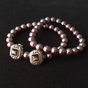 Matching bracelets and a pair of earrings.